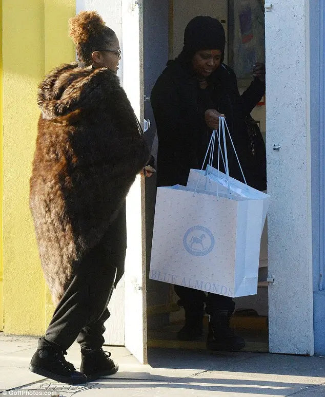 Janet Jackson shops for baby Eissa at Blue Almonds Blue Almonds Ltd