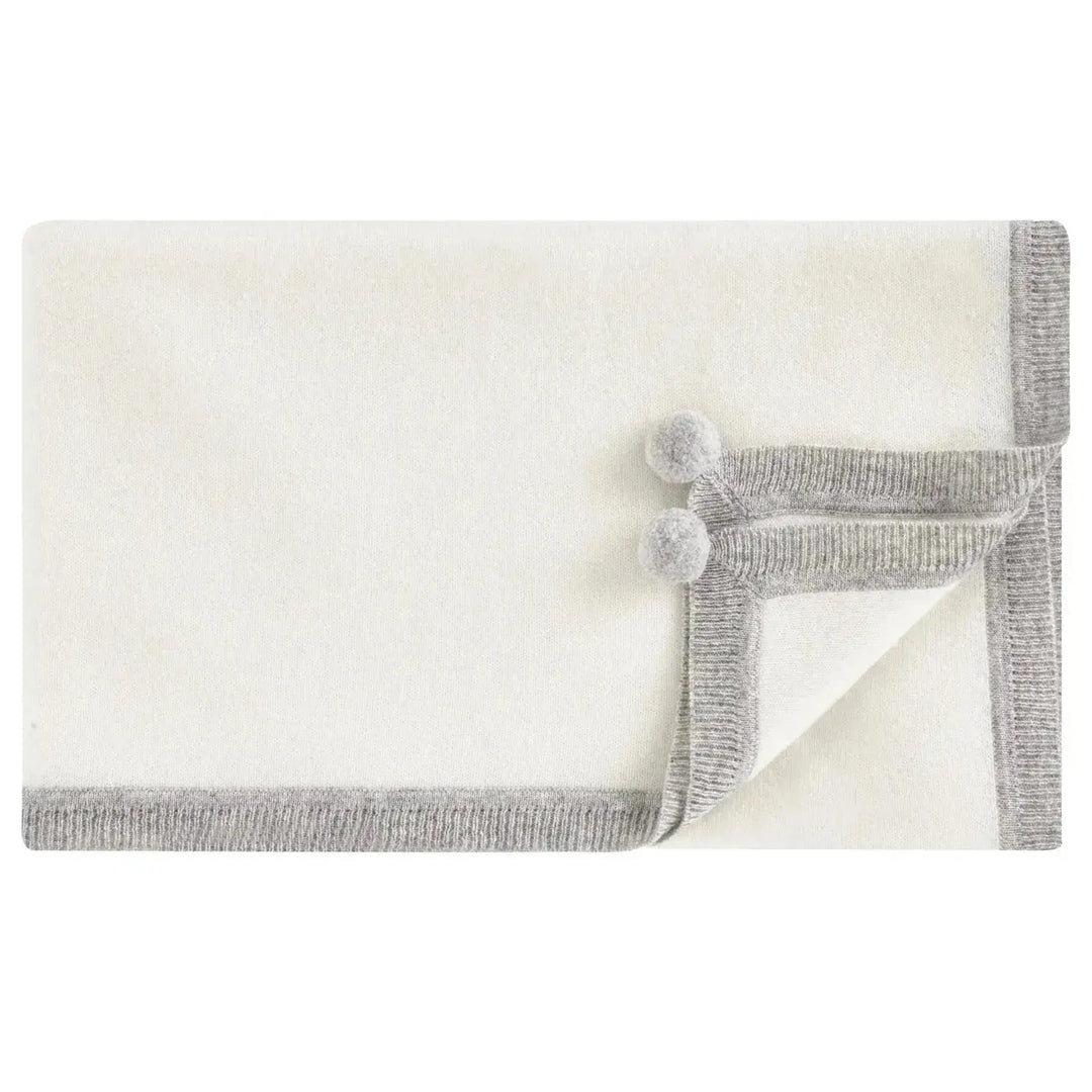 Blue Almonds Ltd Cashmere pompoms blanket clotted cream Blue Almonds x Madeleine Thompson