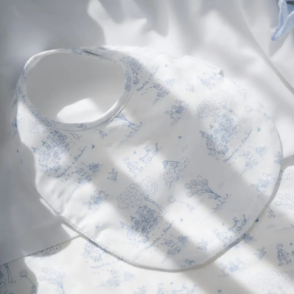 Blue Almonds Ltd Printed Blue Garden Party bib Theophile & Patachou